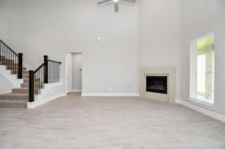 Take another glimpse into the heart of the home with this additional view of the family room—a sprawling space ready to accommodate all your gatherings.