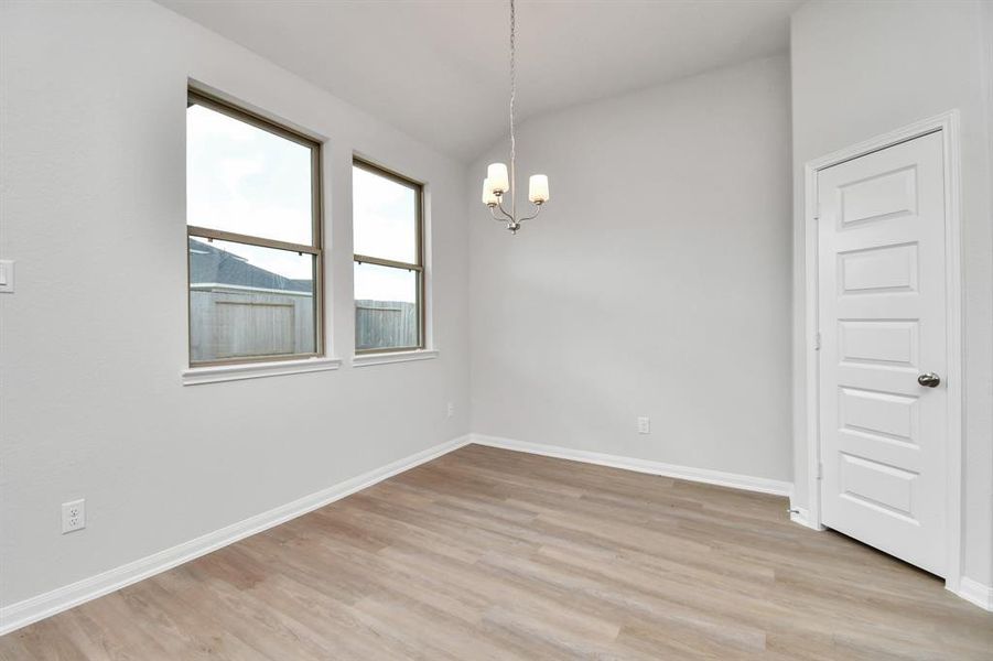 Discover this beautiful and bright dining area placed conveniently near the kitchen and family room!