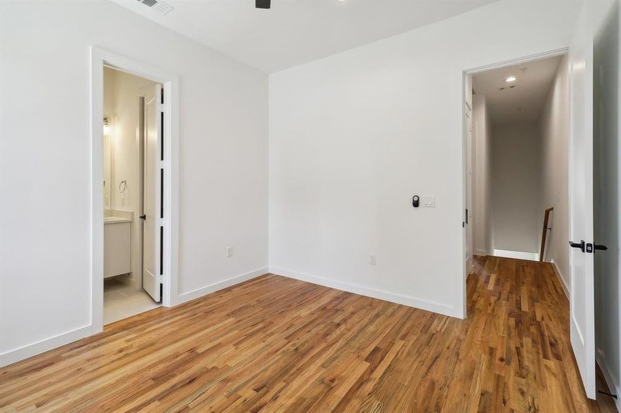 Unfurnished room with light hardwood / wood-style floors