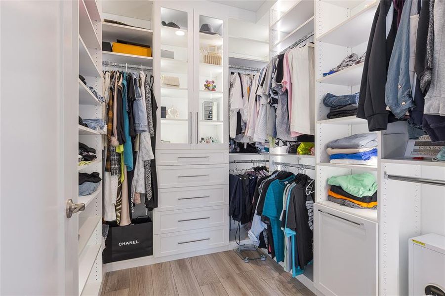 Owner's closet with custom shelving