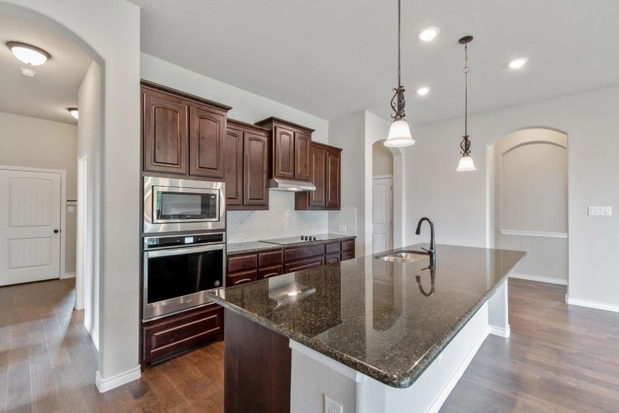 Kitchen | Concept 2671 at Oak Hills in Burleson, TX by Landsea Homes