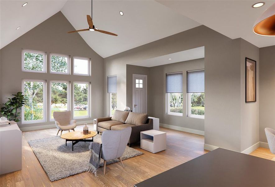 Living room with vaulted ceilings and lots of light.