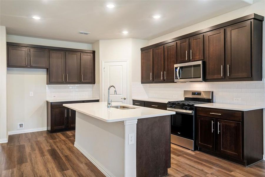 Loads of counter space with a corner pantry