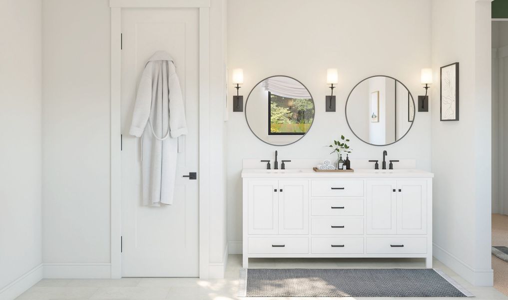 Primary bath with dual sinks and circular mirrors