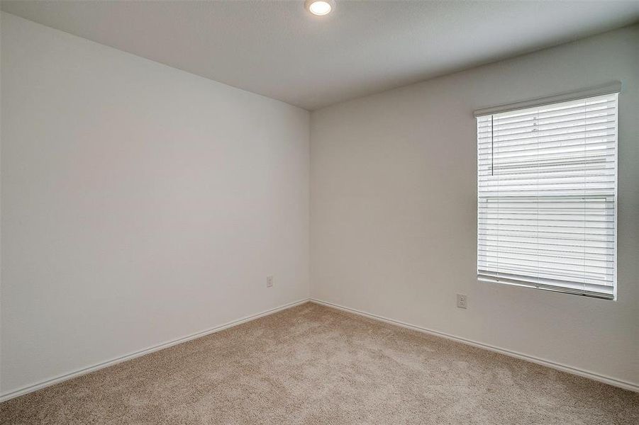 Spare room with carpet floors