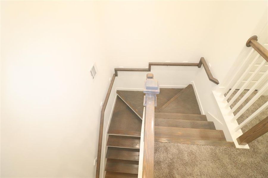 *Home has similar finishes** Stained hardwood oak stair treads and hand rails.