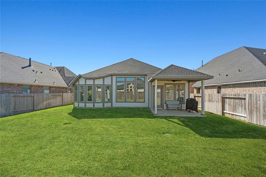 Covered patio, perfect for grilling and entertaining