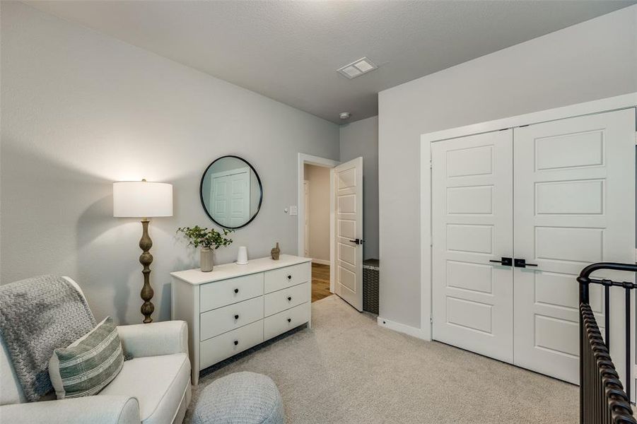 Bedroom with carpet flooring