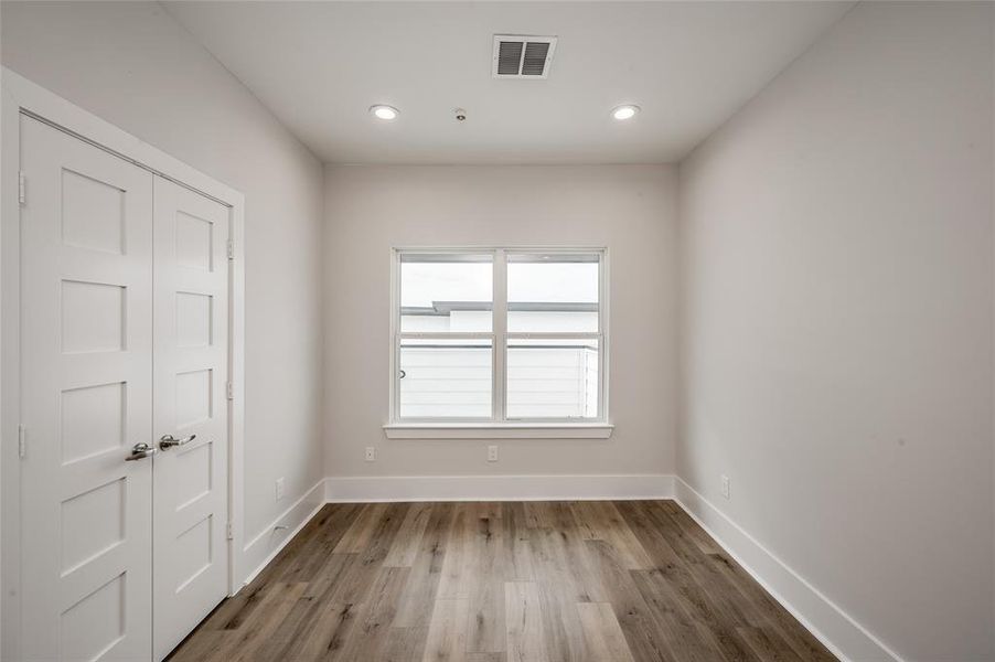 The fourth floor bedroom would also be a great space for a home office.