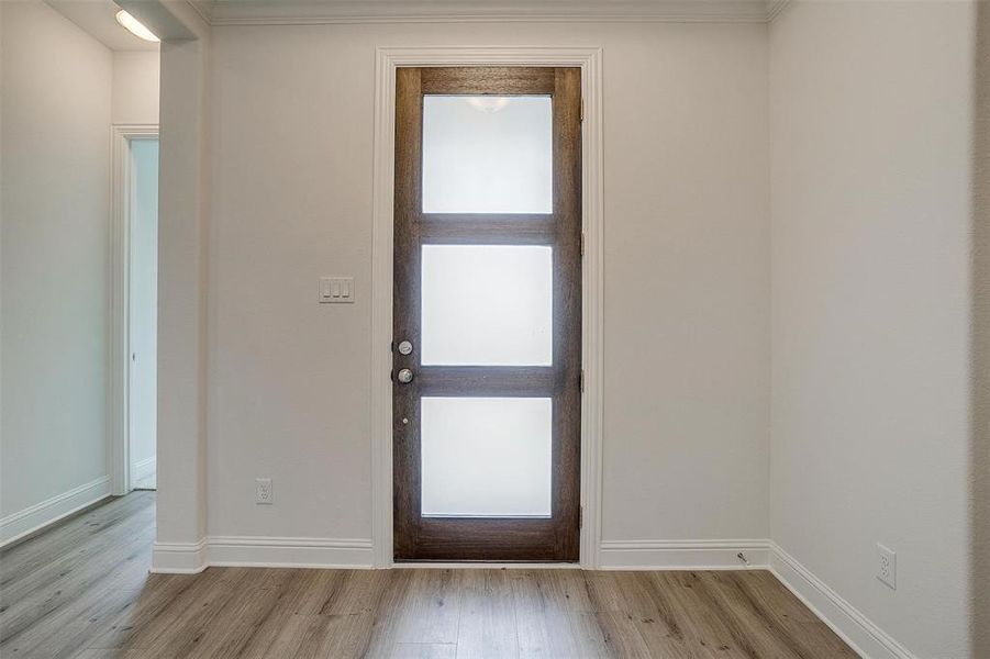 Foyer featuring light hardwood / wood-style flooring