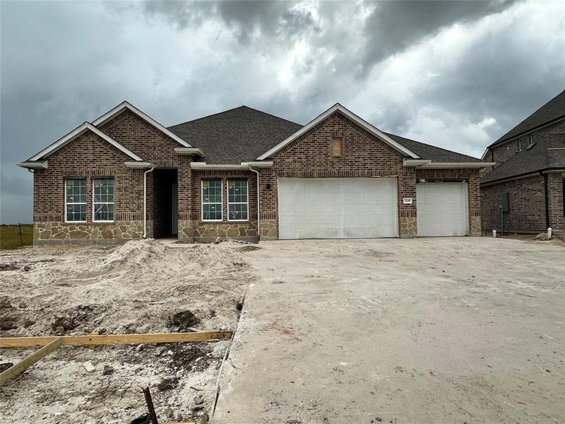 One-story home with 4 bedrooms, 3.5 baths and 4 car tandem garage