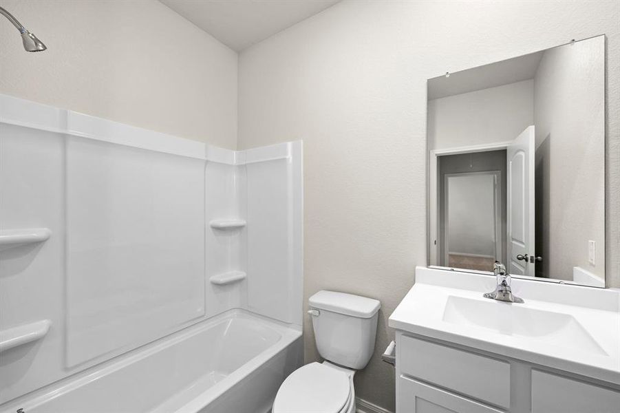 The secondary bathroom features a full shower-bath combo for your children to get ready for school in the mornings.