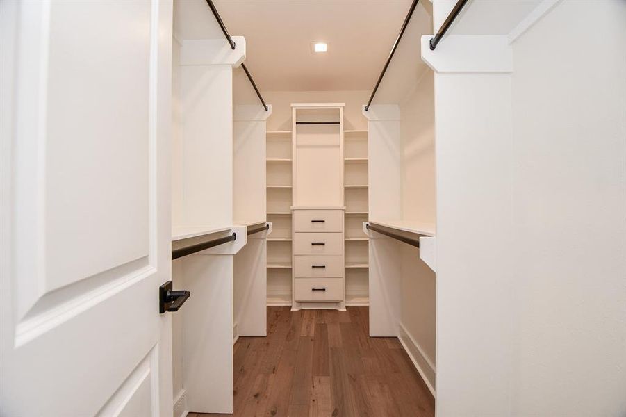 How can you tell if a home has quality? Look at the details. These homes feature a large master closet with custom shelving that uses custom metal rods instead of the wood rods