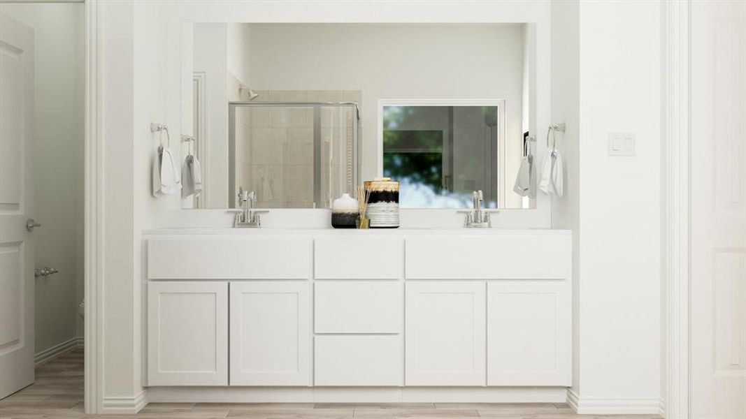 Bathroom featuring hardwood / wood-style floors, a shower with door, and vanity