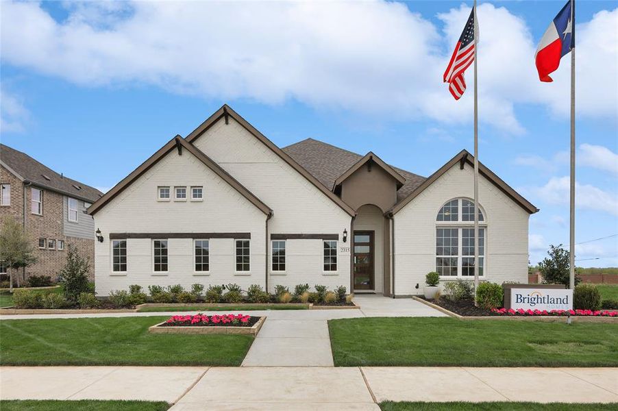 View of front of property featuring a front lawn