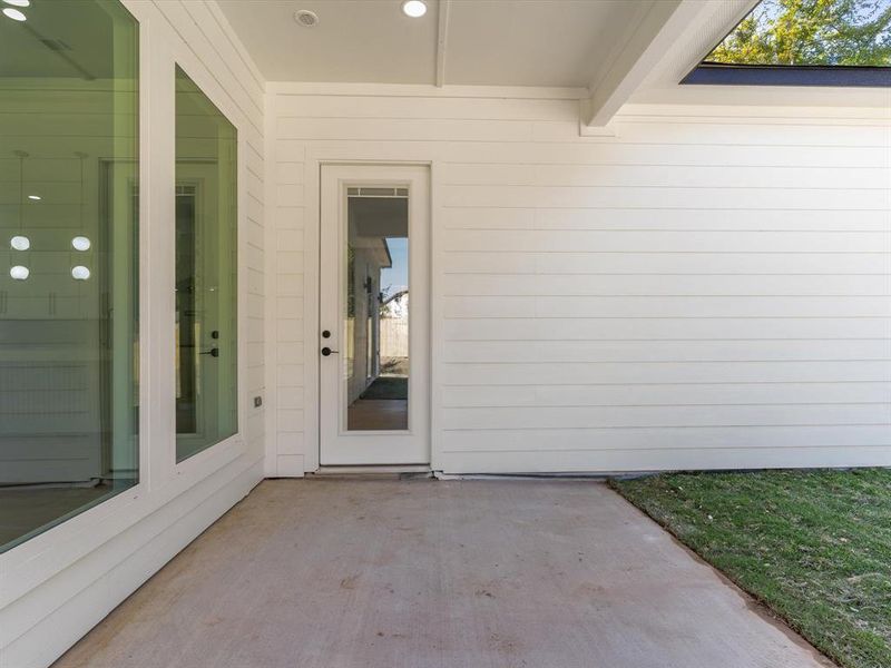 Doorway to property with a patio