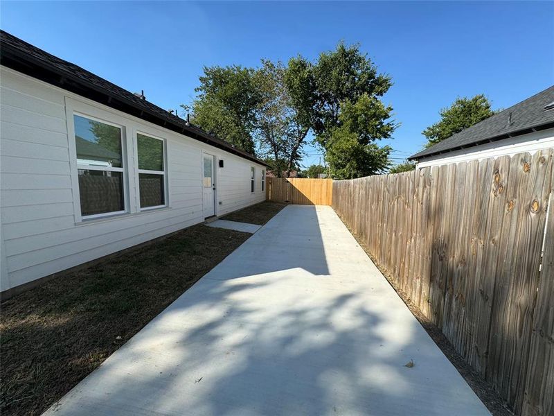 View of property exterior featuring a patio area