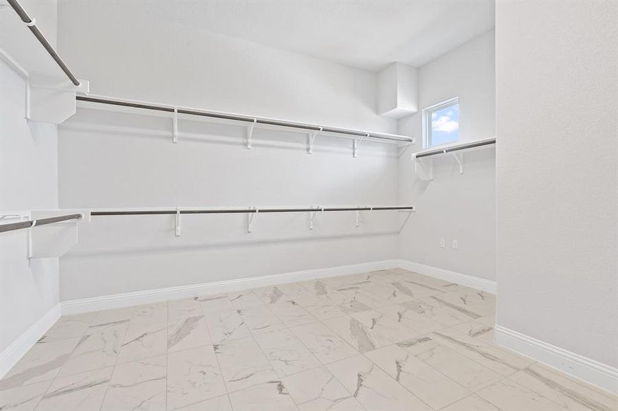 Huge walk in closet for primary bedroom