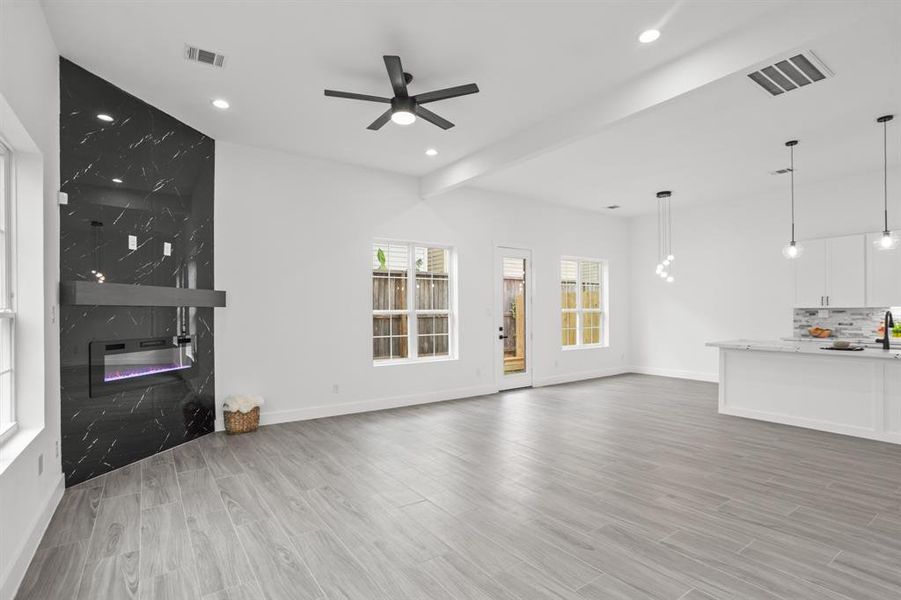 The living room is open to the kitchen.