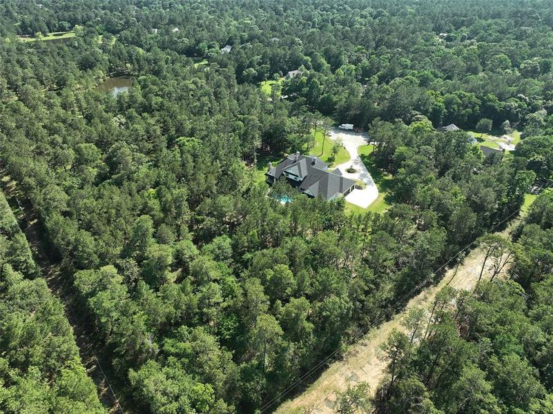 An aerial view to show you just how wooded the back of the house really is. You will love the privacy that you have!