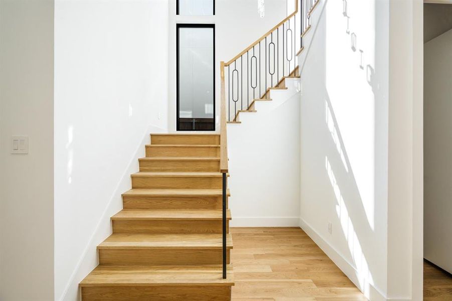 Staircase with wood-type flooring