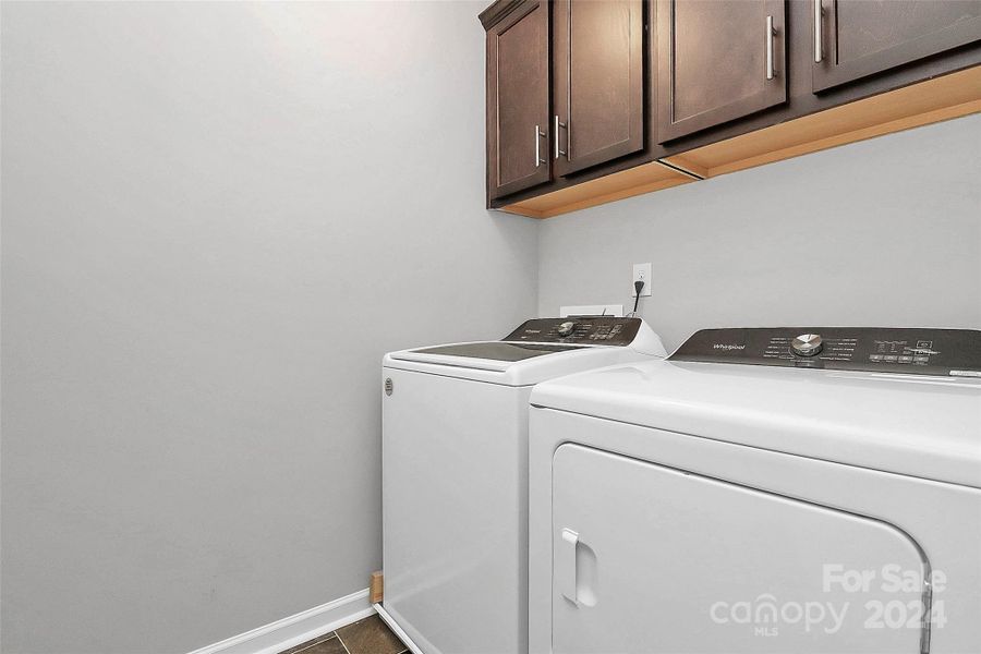 Laundry Room w/ built in cabinets