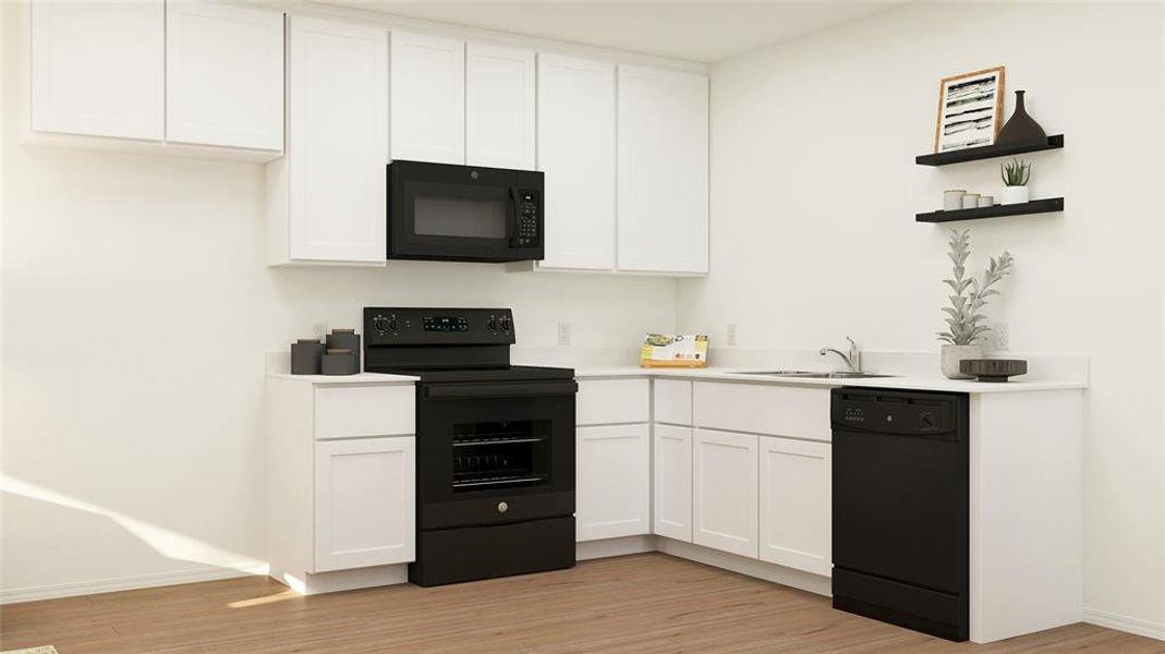 Kitchen featuring white cabinets, light wood-type flooring, sink, and black appliances