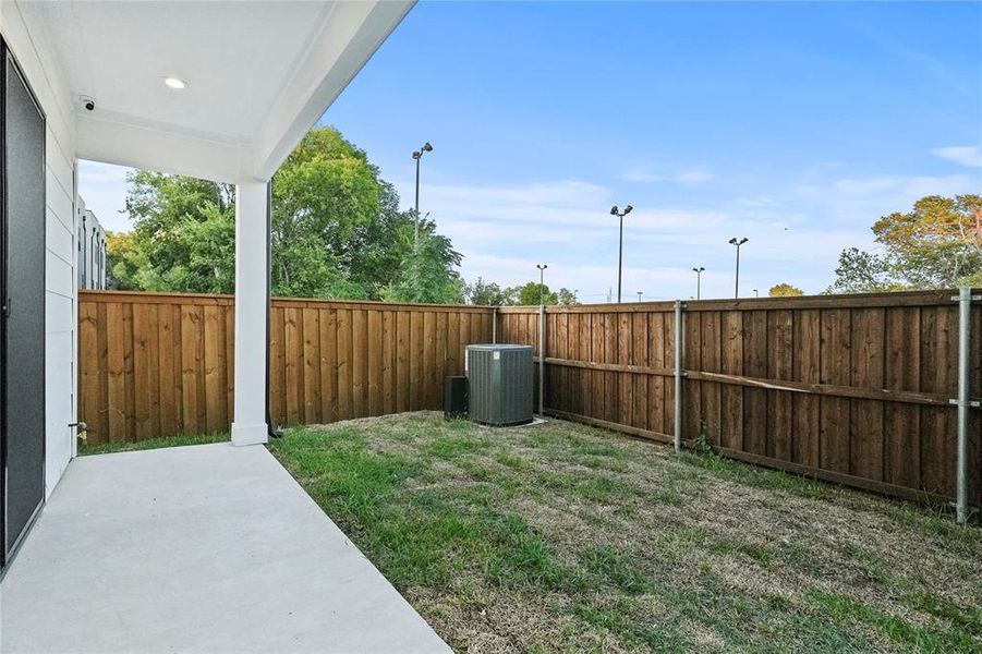 View of yard featuring central air condition unit