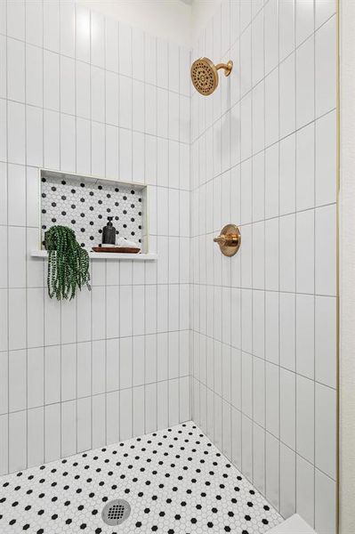 Bathroom with a tile shower