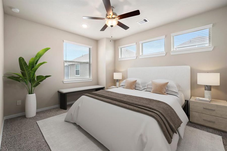 What a wonderful place to come home to, this stunning primary suite greets you with plush carpet, a neutral paint, recessed lighting, ceiling fan with lighting, lovely windows with blinds allowing in natural light brightening up this spacious primary bedroom.