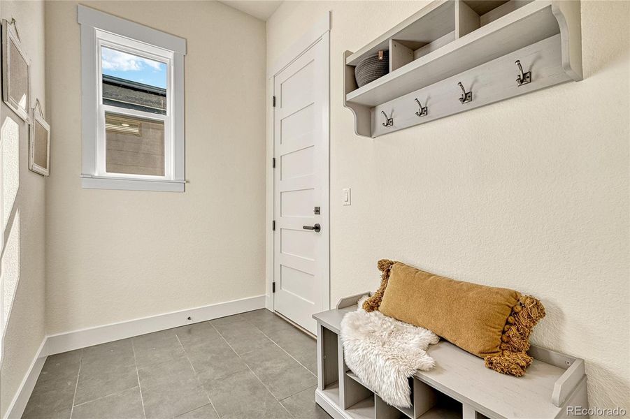 Enjoy the spacious mud room with functional built-in's!