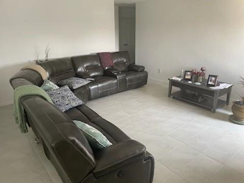 View of tiled living room