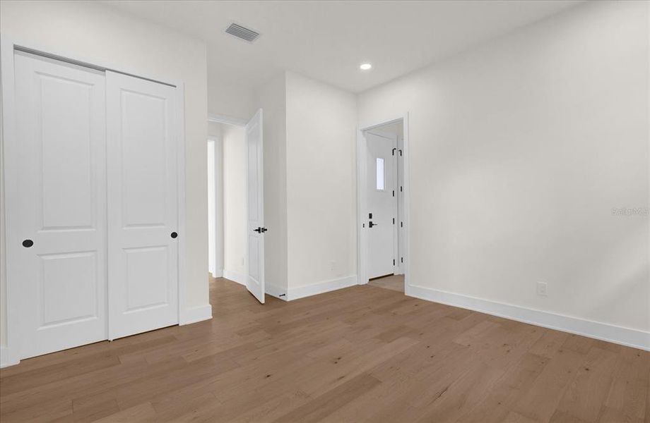 Guest bedroom also features an en suite bathroom