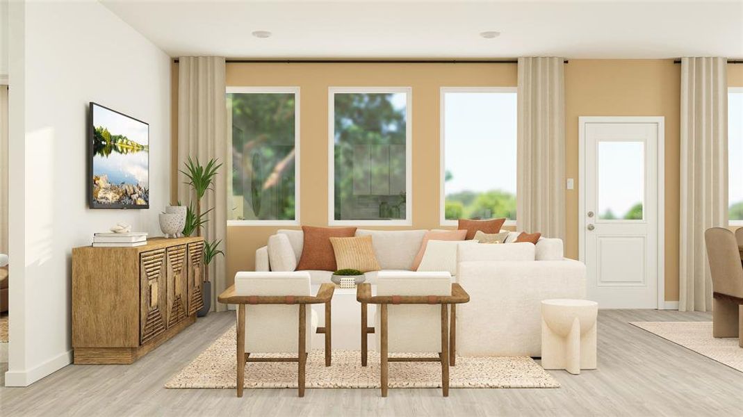 Living room with light hardwood / wood-style flooring