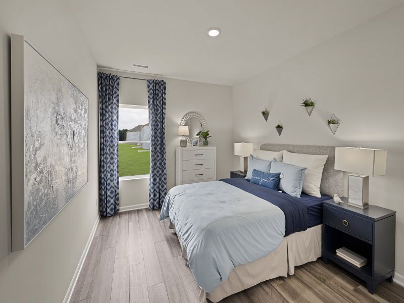 Secondary bedroom in the Johnson floorplan at a Meritage Homes community in Wendell, NC.