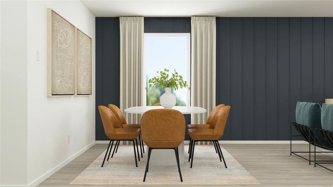 Dining area with light hardwood / wood-style floors