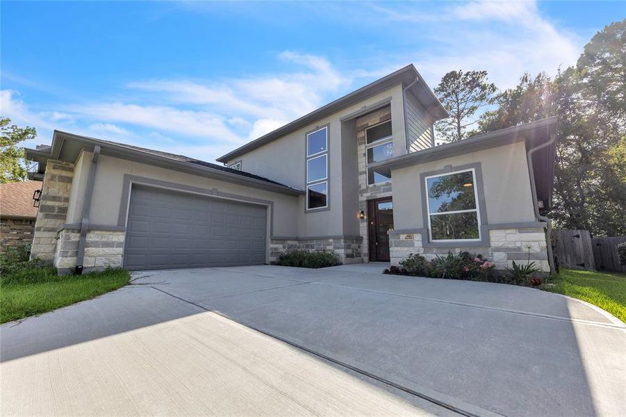 Nice size driveway with a side garage.