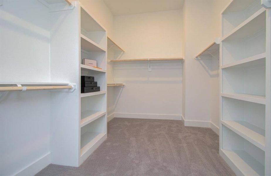Over-sized walk-in primary closet