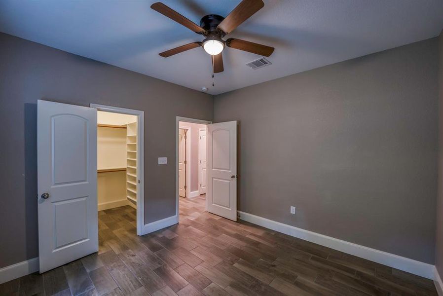 Each secondary bedroom has well fitted walkin closet with attractive shelving