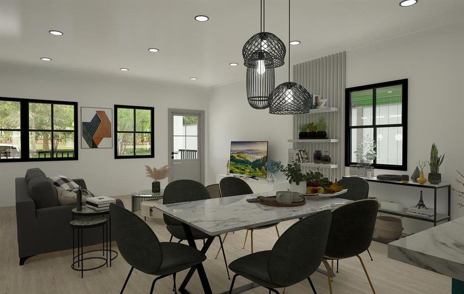 Dining area with ornamental molding and light hardwood / wood-style floors