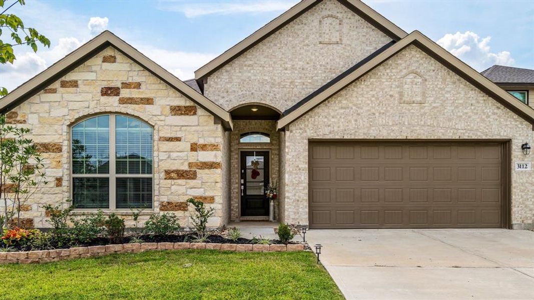 Lennar Homes Hanover II elevation C has stone and brick elevation.