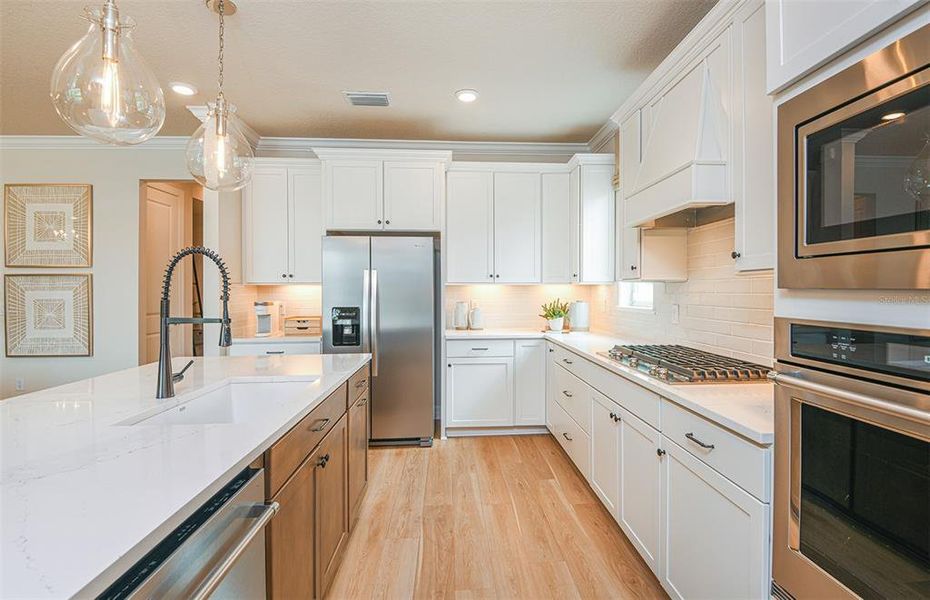 Ample Counter Surface and Cabinet Space