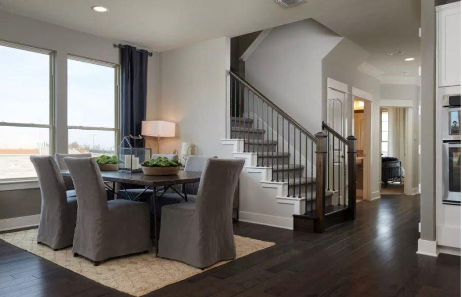 Photo of Pulte model home with same floor plan, not of actual home listed.