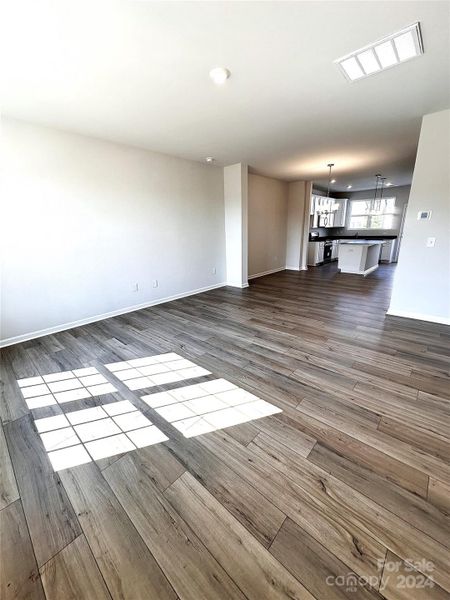 DIGITAL SIMILAR IMAGE- Living room opens into dining room and a gourmet kitchen