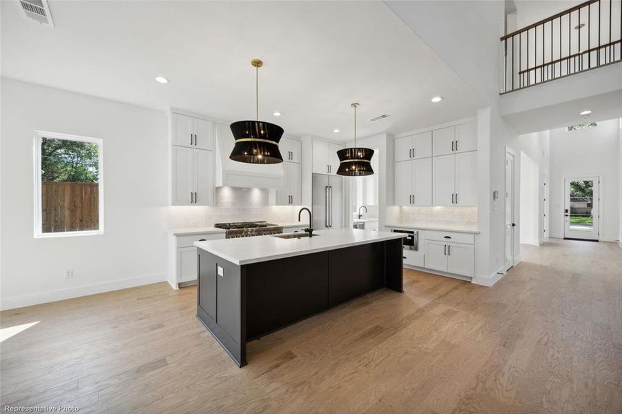 Open concept kitchen with breakfast bar