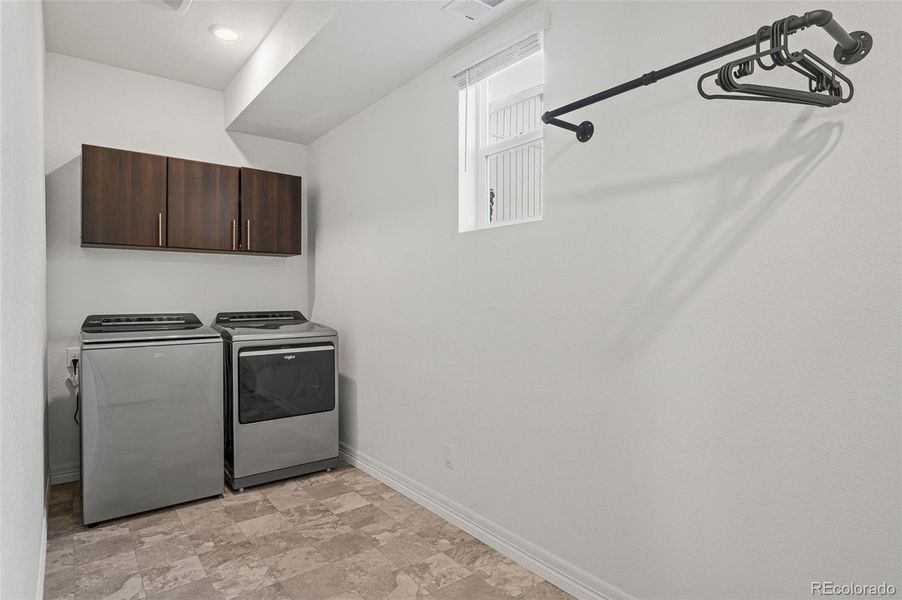 Primary bedroom walk in closet