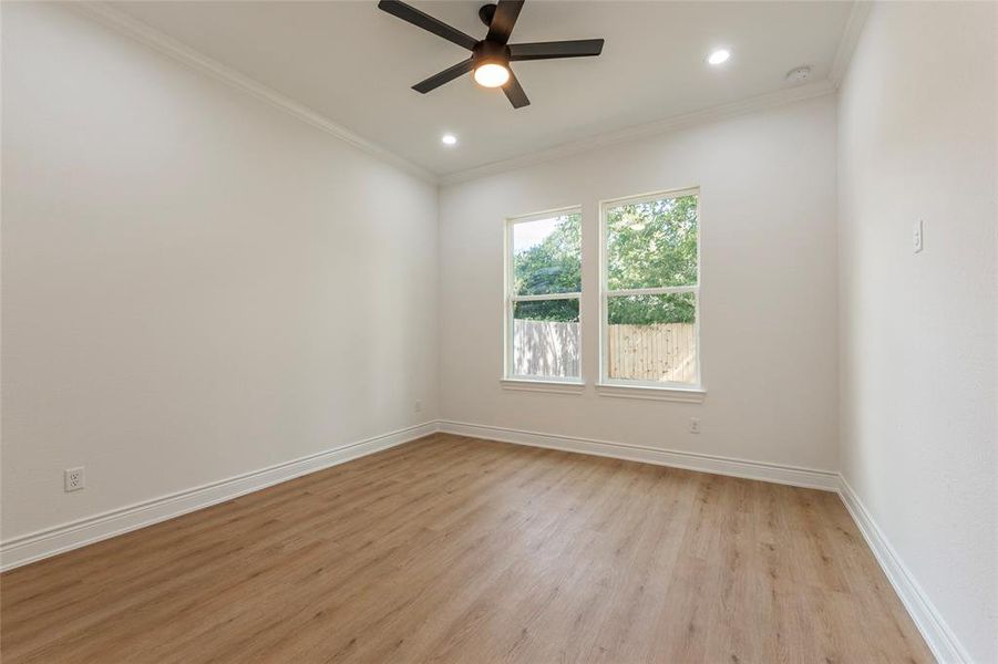 Bedroom 3 with view of the backyard