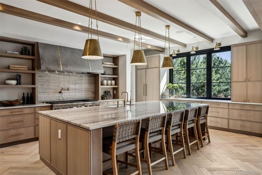 Gourmet kitchen with accordian glass windows