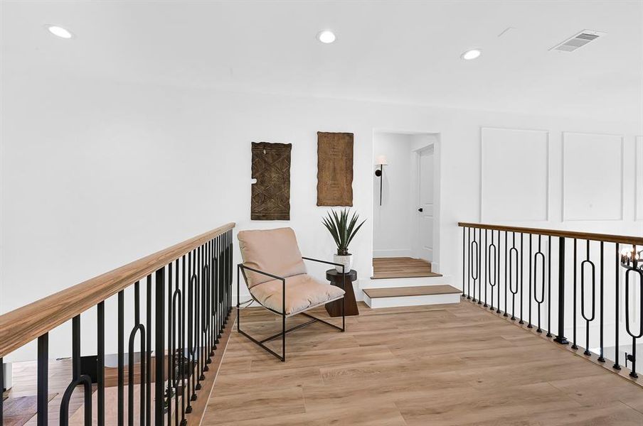 Sitting area leading to 3 bedrooms on second floor.