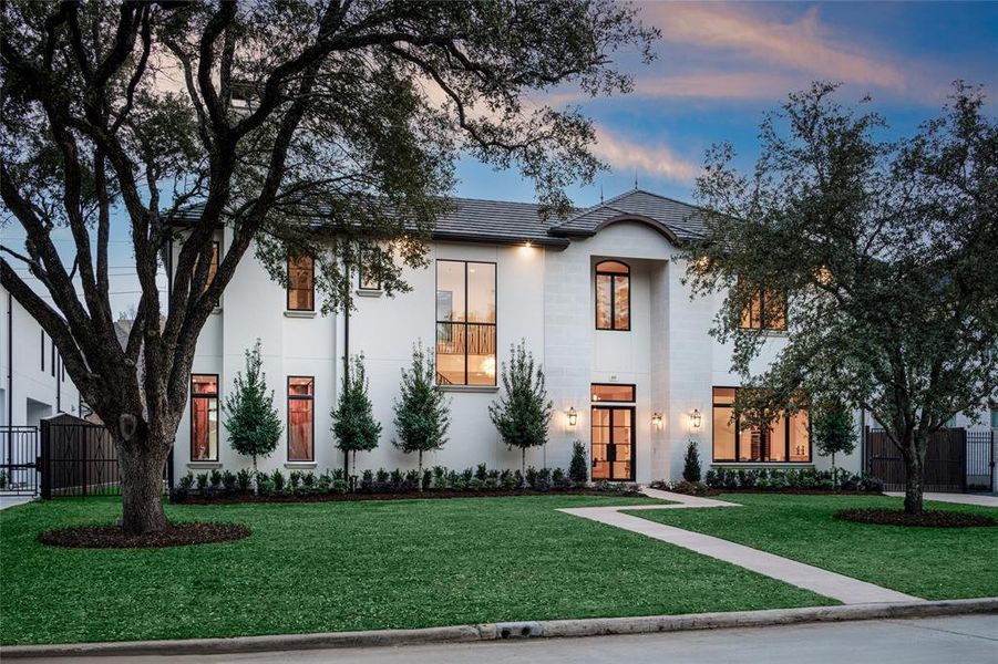 A unique Modern classic home located in one of Tanglewood prestigious neighborhoods framed with gorgeous front yard trees. Luxury unique interior, elevator and natural light radiating throughout